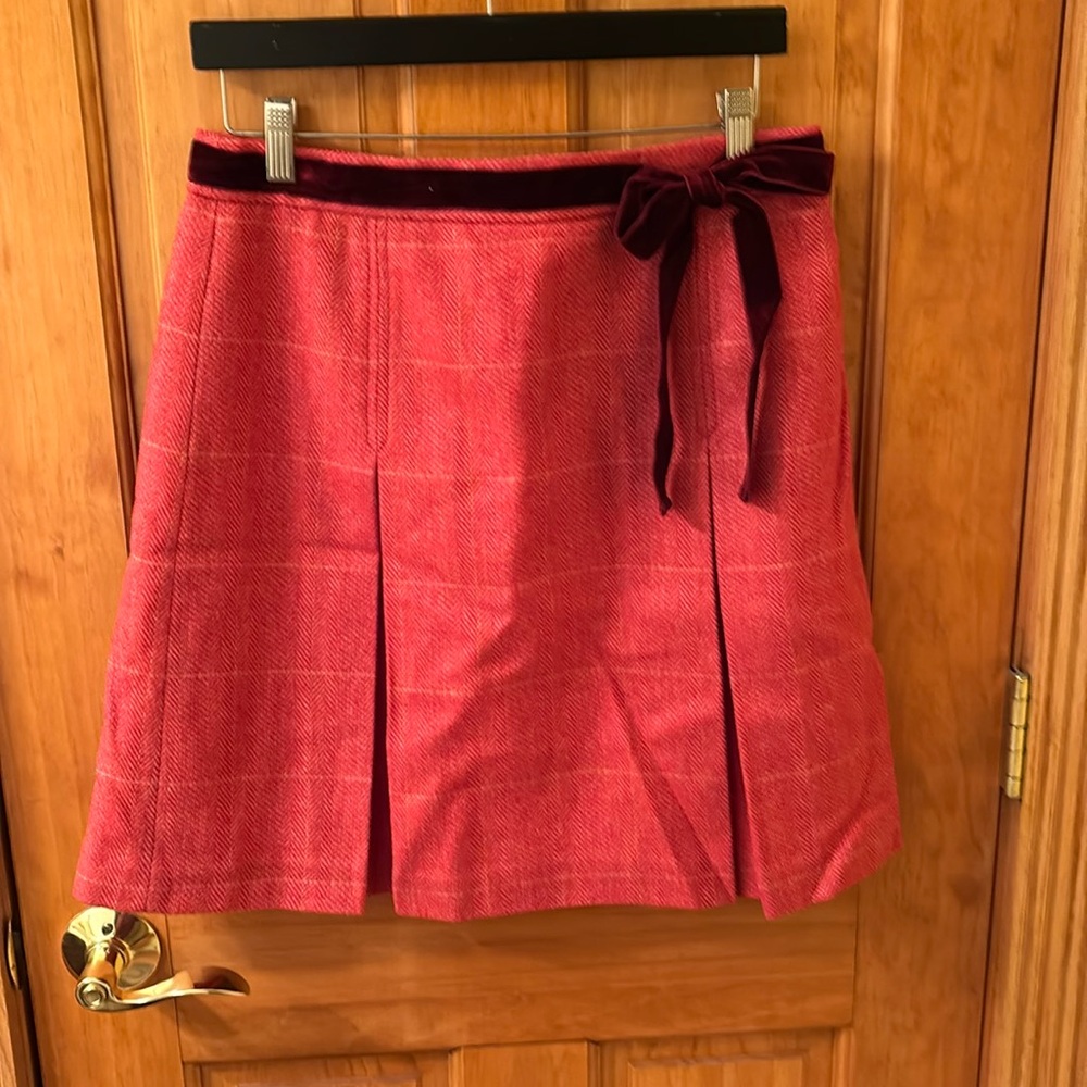 Lovely pleated wool skirt in apricot by J Crew. Size 8.